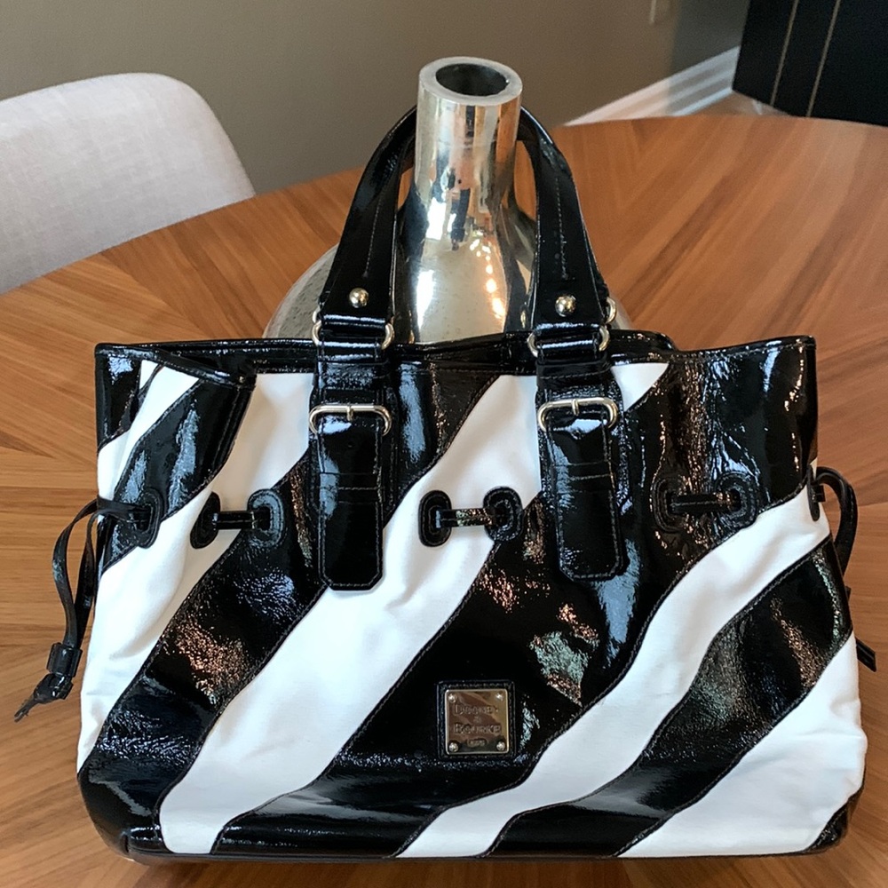 Dooney and Bourke black and white hand bag.